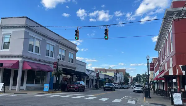 Salem Street in historic downtown Apex under a summer sky