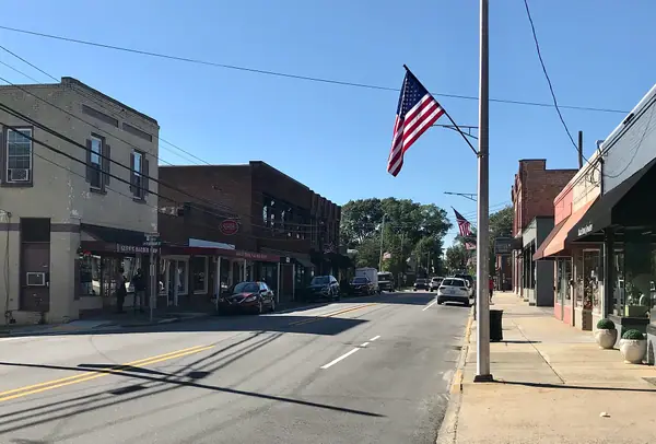 East Main Street in downtown Clayton with flags out