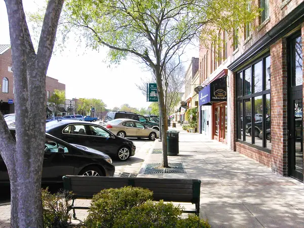 Storefronts and sidewalk along the Varina district in downtown Fuquay-Varina