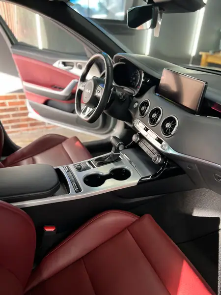 Kia Stinger red leather interior after an interior detail